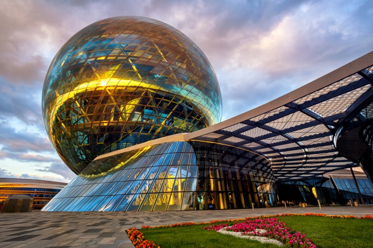 The Nur Alem sphere at the AIFC campus in Astana at sunset